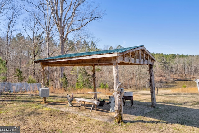 view of home's community featuring a wooded view