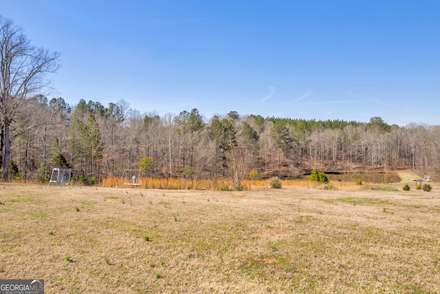 view of landscape featuring a view of trees