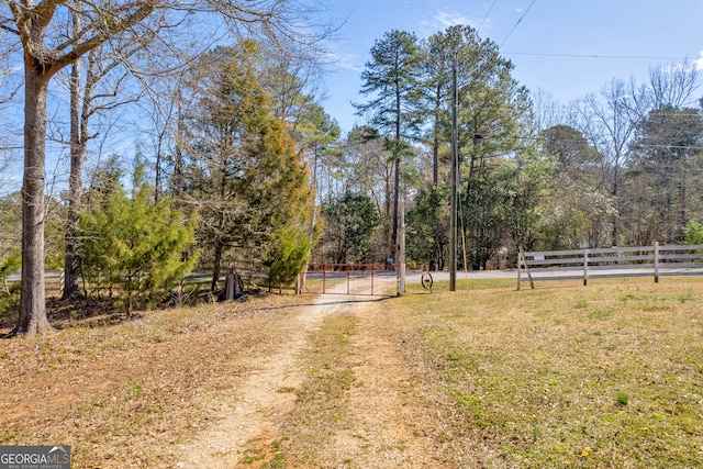 view of yard with a gate and fence