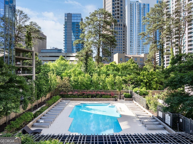 3445 Stratford Rd NE Unit 1605, Atlanta, GA 30326 - community pool featuring a city view and fence