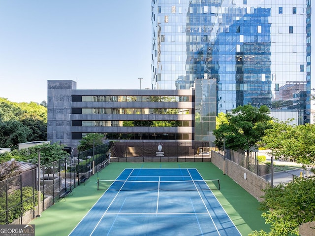 3445 Stratford Rd NE Unit 1605, Atlanta, GA 30326 - view of tennis court featuring fence and a city view