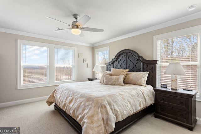 bedroom with light carpet, ceiling fan, ornamental molding, and baseboards