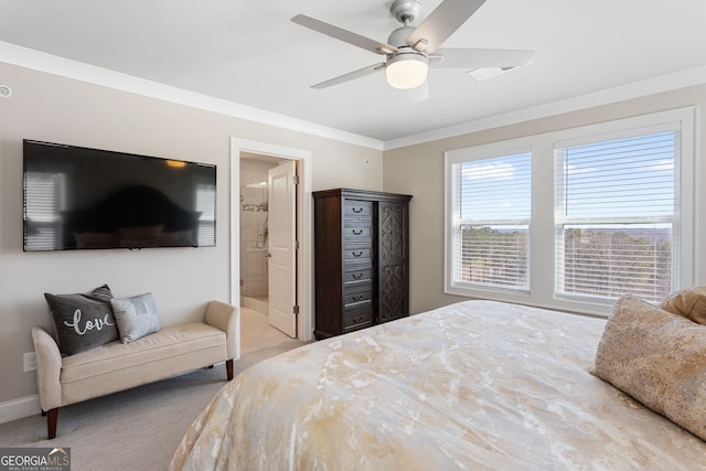 bedroom with visible vents, baseboards, ceiling fan, ensuite bathroom, and crown molding