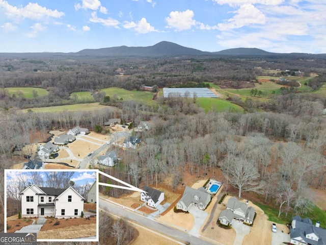 aerial view featuring a mountain view