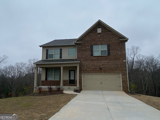 traditional-style home with a garage, driveway, brick siding, and a porch