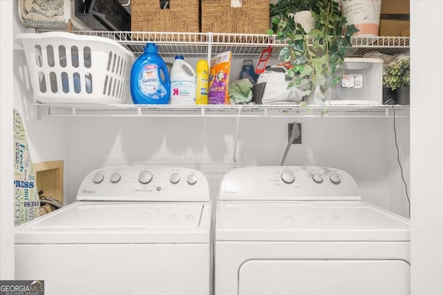 laundry room featuring laundry area and separate washer and dryer