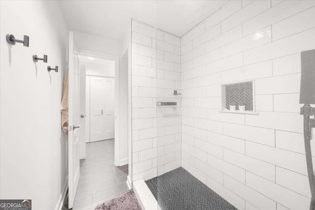 bathroom featuring a stall shower and tile patterned floors