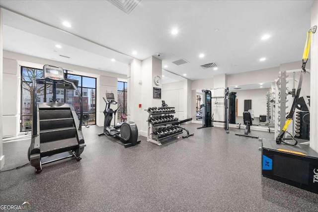 workout area featuring recessed lighting, visible vents, and baseboards