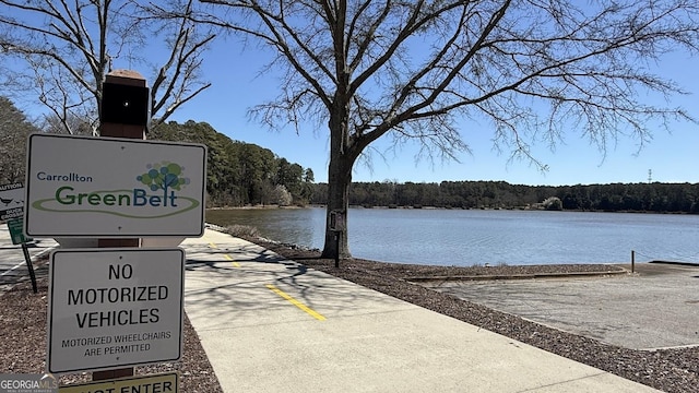 view of home's community featuring a water view