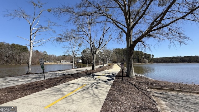 view of property's community with a water view