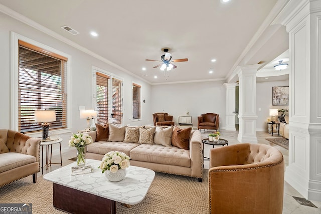 living room with recessed lighting, visible vents, a ceiling fan, ornamental molding, and ornate columns