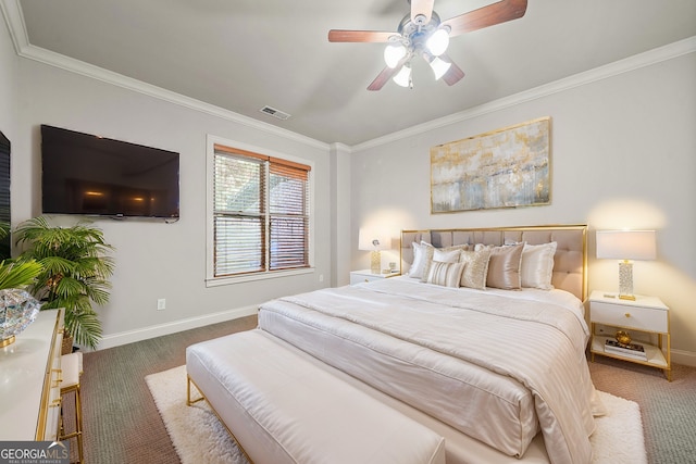 bedroom with baseboards, carpet floors, and crown molding