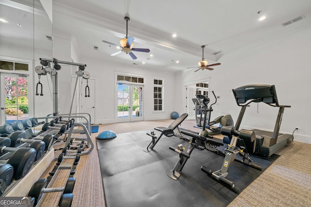 workout area featuring ceiling fan, ornamental molding, visible vents, and baseboards