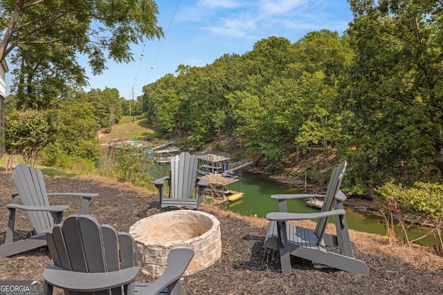 6564 Bermuda Ln, Flowery Branch, GA 30542 - view of yard featuring a dock and a water view