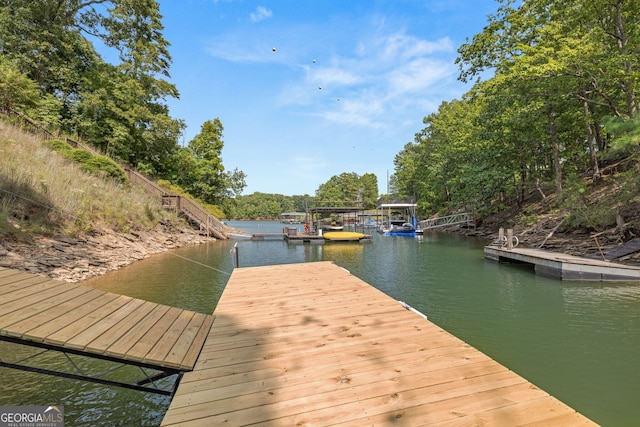 6564 Bermuda Ln, Flowery Branch, GA 30542 - dock area featuring a water view and view of scattered trees