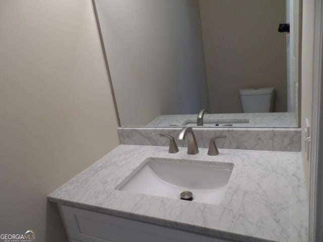 half bath with toilet and vanity