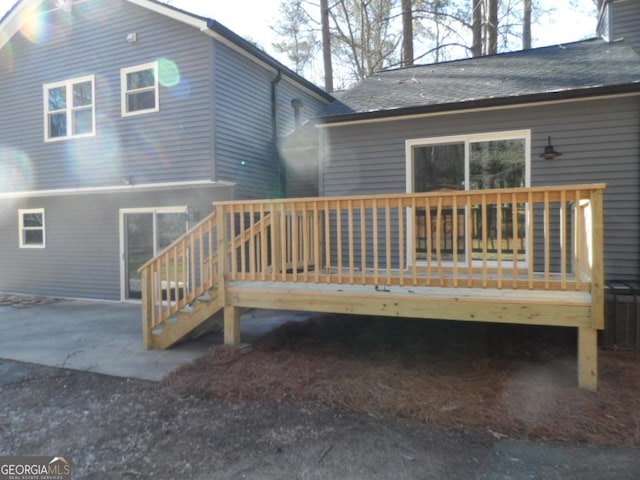 rear view of house with a deck