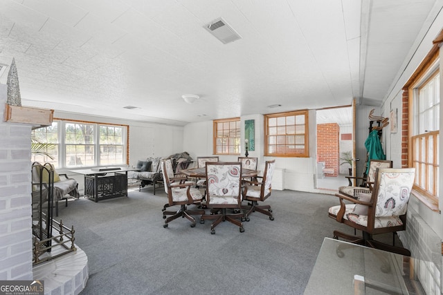 dining space with visible vents and carpet floors