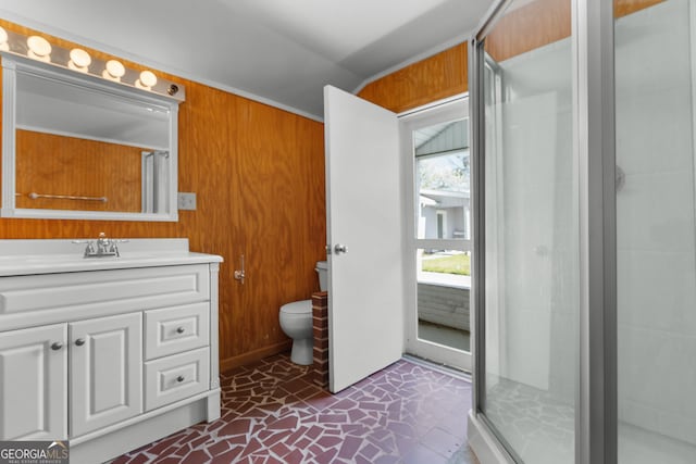 full bath featuring an enclosed shower, toilet, wood walls, vanity, and vaulted ceiling