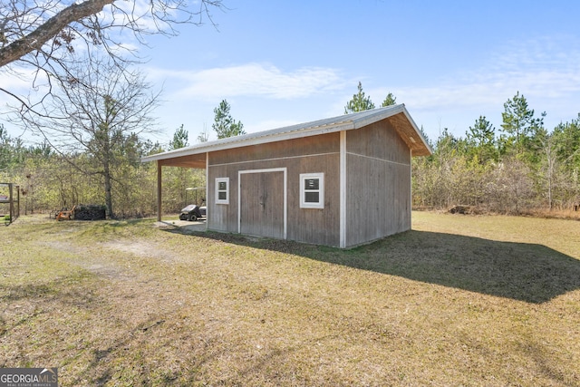 view of outbuilding with an outdoor structure