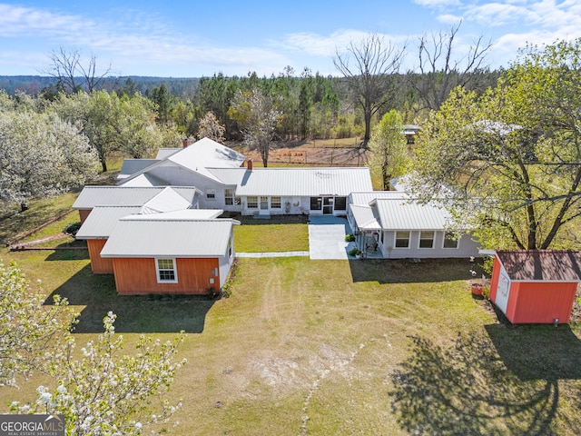 drone / aerial view with a forest view