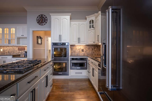 132 Sanderlin Mountain Dr S, Big Canoe, GA 30143 - kitchen featuring high end fridge, black gas cooktop, double oven, glass insert cabinets, and white cabinets