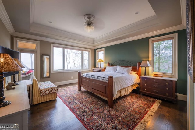 132 Sanderlin Mountain Dr S, Big Canoe, GA 30143 - bedroom featuring a tray ceiling, multiple windows, dark wood-style flooring, baseboards, and crown molding