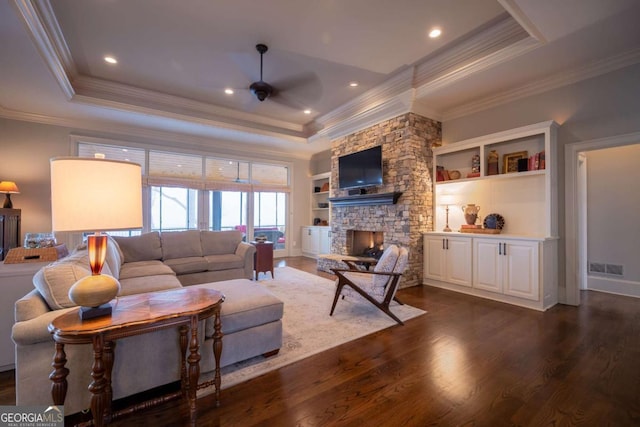 132 Sanderlin Mountain Dr S, Big Canoe, GA 30143 - living area with a raised ceiling, ceiling fan, crown molding, dark wood finished floors, and a stone fireplace