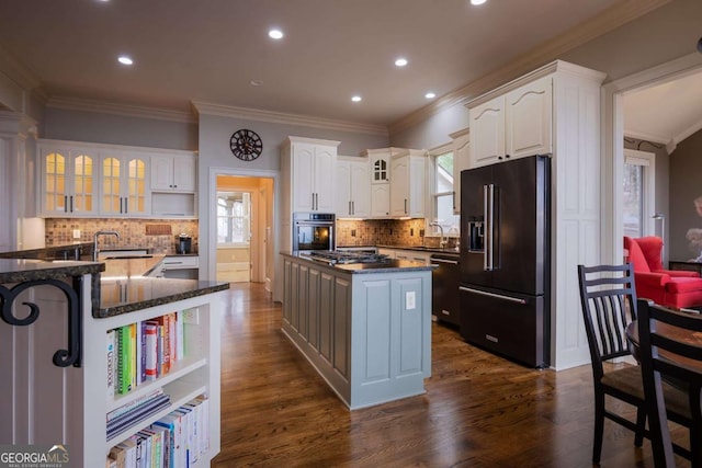 132 Sanderlin Mountain Dr S, Big Canoe, GA 30143 - kitchen featuring black appliances, open shelves, a center island, crown molding, and white cabinetry