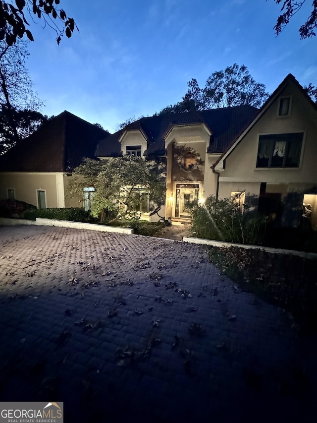 view of front of house featuring stucco siding