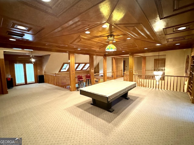 game room with wainscoting, carpet flooring, and a ceiling fan