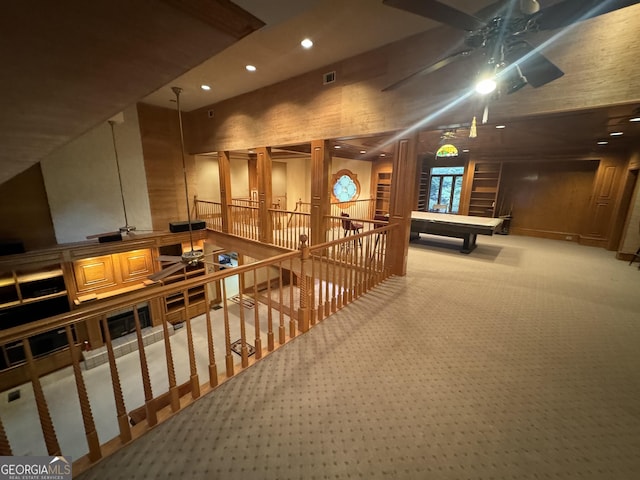 corridor with carpet, visible vents, and recessed lighting