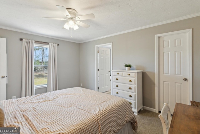 bedroom with ceiling fan, baseboards, light colored carpet, ornamental molding, and a textured ceiling