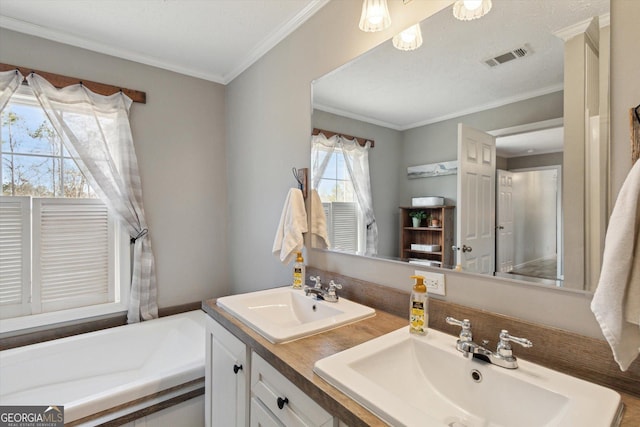 full bath featuring visible vents, ornamental molding, and a sink