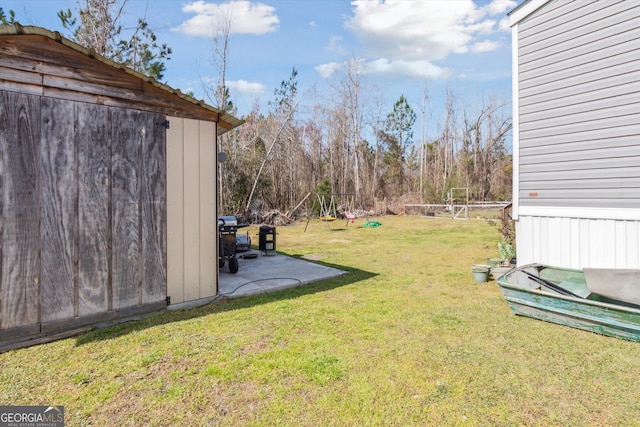 view of yard with a patio and fence