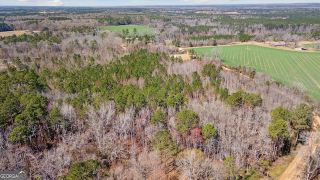 drone / aerial view with a view of trees