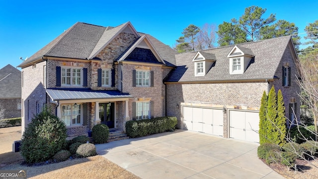 view of front of house with a porch, brick siding, driveway, and roof with shingles