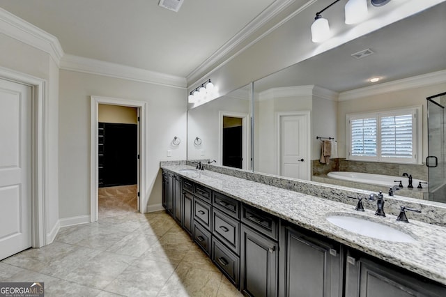 full bathroom with ornamental molding, a sink, and a bath