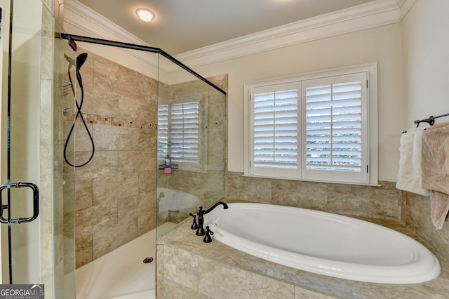 full bathroom with a garden tub, ornamental molding, and a shower stall