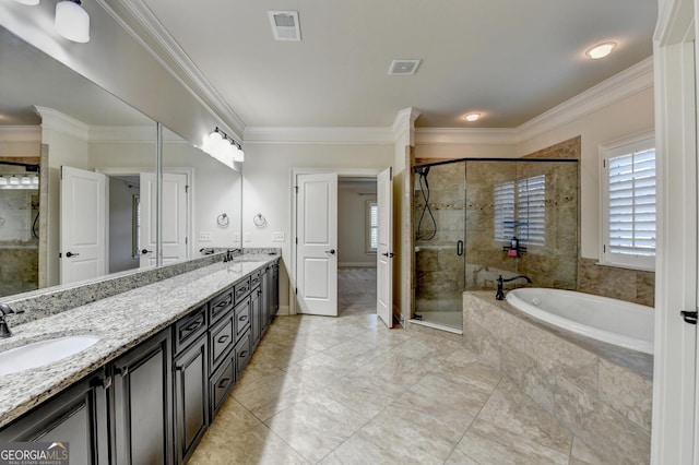 full bath featuring crown molding, a stall shower, visible vents, and a sink