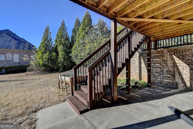 view of patio / terrace featuring stairs