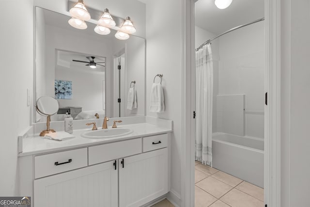 bathroom with tile patterned floors, vanity, a ceiling fan, ensuite bath, and shower / bath combo with shower curtain