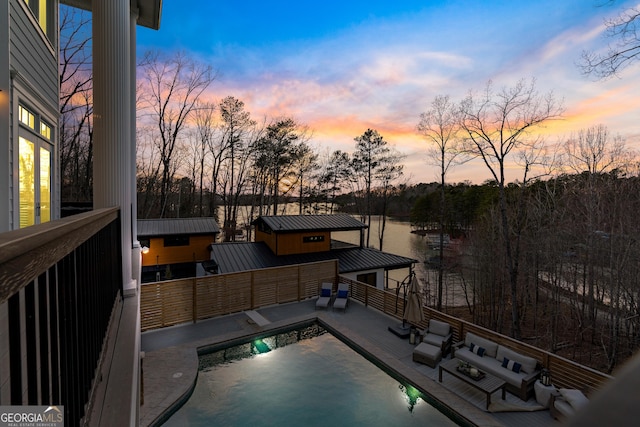 view of swimming pool with an outdoor hangout area