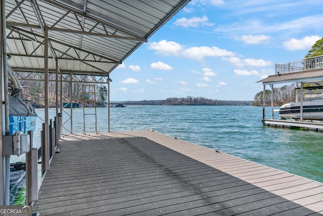 view of dock with a water view
