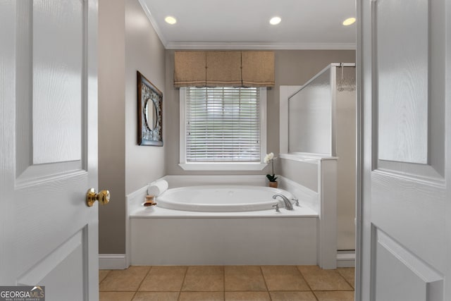 bathroom with a stall shower, tile patterned flooring, crown molding, and a bath