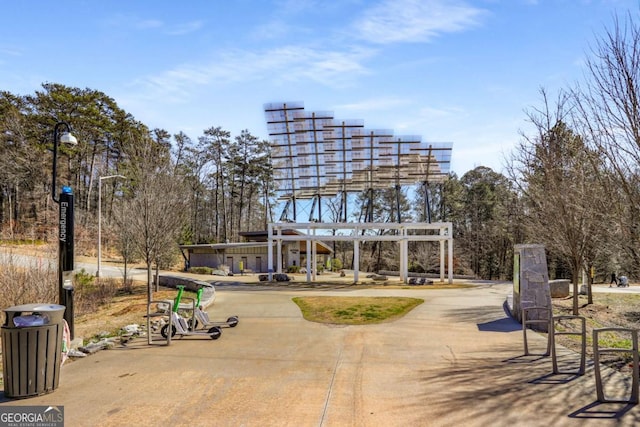 view of home's community featuring a pergola