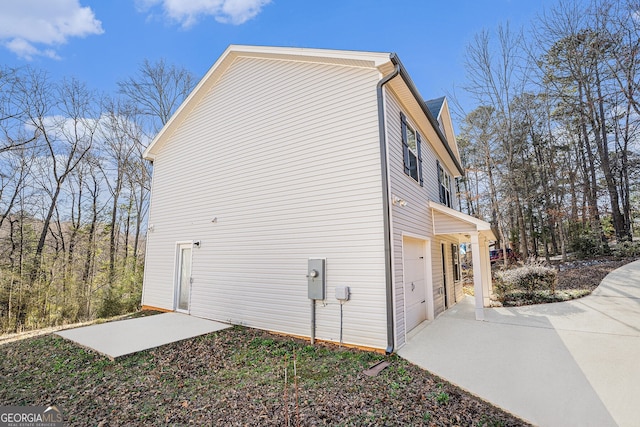 view of home's exterior featuring a garage