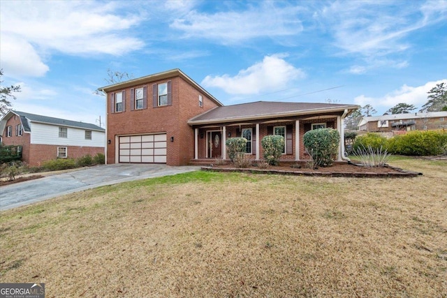 view of front of house with brick siding, a porch, concrete driveway, an attached garage, and a front yard