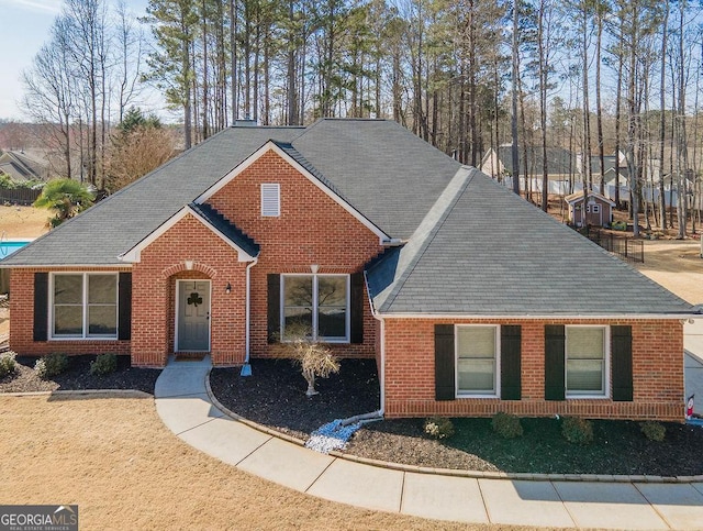 ranch-style house with brick siding