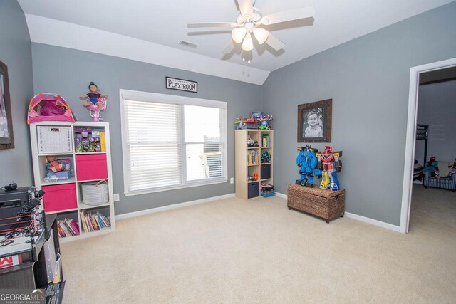 rec room with carpet, visible vents, lofted ceiling, and baseboards